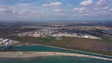 Aerial-left-to-right-traveling-over-a-industrial-complex-gas-and-oil-storage